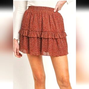PAPER CRANE Smocked ruffle layer mini skirt. Rust/blue. Size small NWT